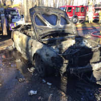 <p>A car was destroyed in a garage fire on Fir Tree Lane in Newtown on Sunday</p>