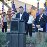 <p>Danbury Mayor Mark Boughton prepares to make remarks at the 9/11 ceremony on Friday evening.</p>