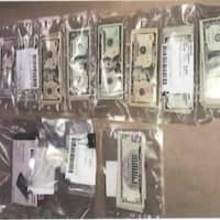 <p>Cash seized in a raid in Bridgeport</p>