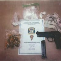 <p>Guns, drugs and cash seized in a raid in the East End of Bridgeport</p>