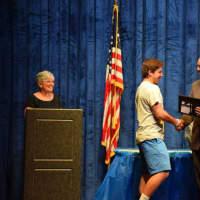 <p>A student accepts an award during Monday&#x27;s awards night at Bronxville High School.</p>