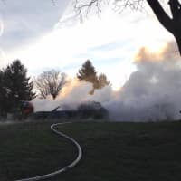 <p>Brookfield firefighters responded to a car fire on Johns Road early Thursday.</p>