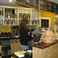<p>A barista works the counter at Bunbury&#x27;s Coffee Shop in Piermont.</p>