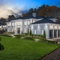 <p>The home at 138 Woodlawn Road was designed by Boston's premier luxury female designer.&nbsp;</p>