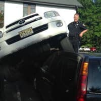 <p>Firefighters and EMS workers assisted the driver.</p>