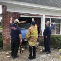 <p>The fire department&#x27;s collapse crew assessing the home a 2006 Chrysler RT Cruiser was pulled out of in the 1000 block of Columbia Avenue Lancaster, Pennsylvania.</p>