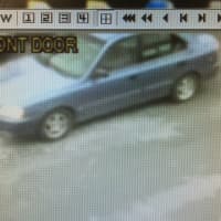 <p>Surveillance image of the car broken into on Brookfield Street in Norwalk.</p>