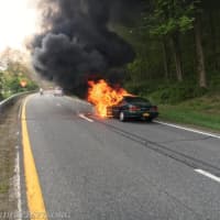 <p>Fire crews from Mount Kisco and Bedford Hills were dispatched to a stretch of the Saw Mill River Parkway, where a car fire shutdown the roadway.</p>