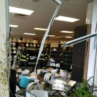 <p>Nobody was reported injured when the car drove into the building.</p>