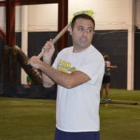 <p>Indian Hills Lacrosse Coach Mike Carti practices shooting before X-Treme Lax Factory&#x27;s club team tryouts on Sept. 20.</p>