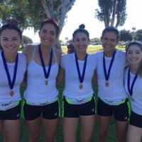 <p>Girls from the Norwalk-based Connecticut Boat Club celebrate after winning gold at a race last weekend in San Diego.</p>