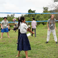 <p>Scarsdale students were in Preah Rumkel, a rural community on the Mekong River they spent a week at the volleyball and English camp</p>