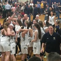 <p>The NV/OT girls basketball team celebrates after beating Ramapo to win a sectional title.</p>