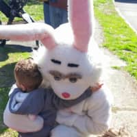 <p>Chase Adams hugs the Easter Bunny</p>