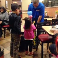 <p>Children take part in an event at Chick-Fil-A in Brookfield. The store is offering a free breakfast through May 31.</p>