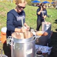 <p>Meredith McGlynn and Alex Fletcher Hirsh serve up samples from Stefano’s in Long Beach Island, N.J., at Sunday&#x27;s Chowdafest in Westport. </p>