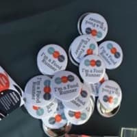 <p>Volunteer food runners for Community Plates get a button to show their commitment to getting unwanted food to where it&#x27;s needed. </p>
