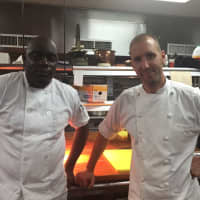 <p>Chefs Choya Hodge, left, and Moshe Grundman, right at Sixty5 On Main in Nyack.</p>