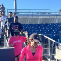 <p>Climbers followed a course of 1,000 steps in the Ballpark at Harbor Yard stadium.</p>