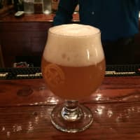<p>A 12 oz. glass of Kuka Ales for ALS Double IPA, brewed in Blauvelt.</p>
