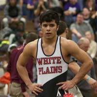 <p>Julio Cruz of White Plains wrestled in a fifth-place match.</p>