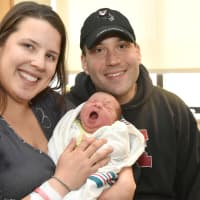 <p>Montvale residents Jennifer and David Cuozzo with baby, Carter.</p>