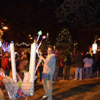<p>Kids enjoy the bright lights and the souvenirs at the tree lighting at the Danbury Library. </p>