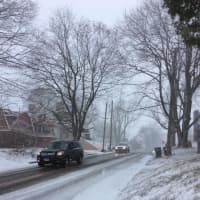 <p>With small flakes flying, enough snow has fallen to cover the roads and make conditions slippery across Fairfield County on Saturday.</p>