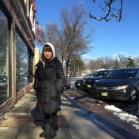 <p>Min Hee Choi of Leonia left her house this morning thinking she&#x27;d need all-day protection from the snow.</p>