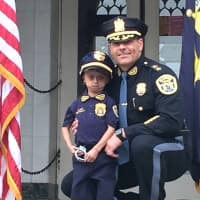 <p>Fairview &quot;Chief For a Day&quot; Diego Estrada with Police Chief Martin Kahn</p>