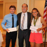 <p>Nick Esposito, with Mayor Tom Calabrese, received eight scholarships, while Jessica Lombardi picked up 12</p>