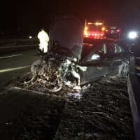<p>This gnarled car was involved in a three-car crash in Trumbull Wednesday night on the Merritt Parkway.</p>