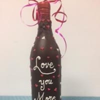 <p>The store can personalize a bottle of wine dipped in chocolate.</p>