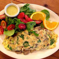 <p>A build-your-own omelette made with mushrooms and spinach at the Farmhouse Café &amp; Eatery in Cresskill.</p>