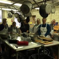 <p>Volunteers at First Congregational Church of Stamford served dinner last year, including turkeys cooked at The Water&#x27;s Edge at Giovannis in Darien. </p>