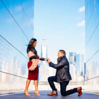 <p>Evan Febrillet shot this engagement photo of Michelle Weber, left, and her fiancé</p>