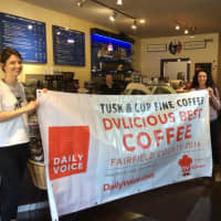 <p>Tusk &amp; Cup in Ridgefield, Conn. proudly displays its DVLicious banner for wining best coffee in Fairfield County.</p>