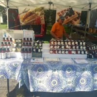 <p>Ron Pinto, creator of Winding Drive Artisan Jams, sets up shop at the Old Greenwich Farmers Market. </p>