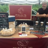<p>Paul Gallant, creator of Paul’s Custom Pet Food, enjoys meeting the customers at the Old Greenwich Farmers Market. </p>