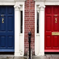 <p>Navy and red remain classic choices for front door colors. Wallauer&#x27;s Design Director Kimberly Scappaticci recommends Benjamin Moore&#x27;s Aura Exterior Paint.</p>