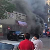 <p>Early on in the Main Street fire Saturday in Hackensack.</p>