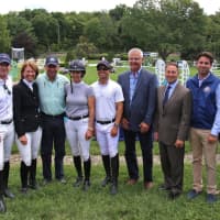 <p>County Executive Rob Astorino, third from right, stands with athletes, horse and government officials at the American Gold Cup.</p>