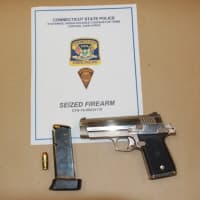 <p>State Police seized a loaded .45-caliber semi-automatic handgun and arrested Raul Zayas on firearms charges.</p>