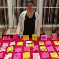 <p>Grace Targonski of Stamford shows the Valentine&#x27;s Day cards she and friends made for childhood cancer patients.</p>