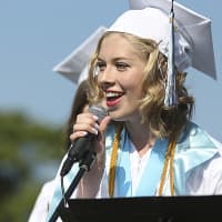 <p>Kiera Torpie sings &quot;Place In the Sun&quot; at the graduation ceremony June 24.</p>