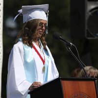 <p>Angelina DiNota speaks to her fellow classmates at the 2016 Westlake High School graduation ceremony.</p>