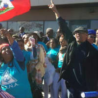 <p>Dozens protest &quot;no haitians&quot; ad</p>