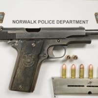 <p>One of the handguns recovered from the vehicle.</p>