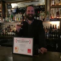 <p>Clark Moore of Harper&#x27;s in Dobbs Ferry with the DVlicious award for best cocktails.</p>