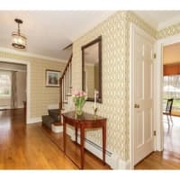 <p>The home has gleaming hardwood floors throughout the home.</p>